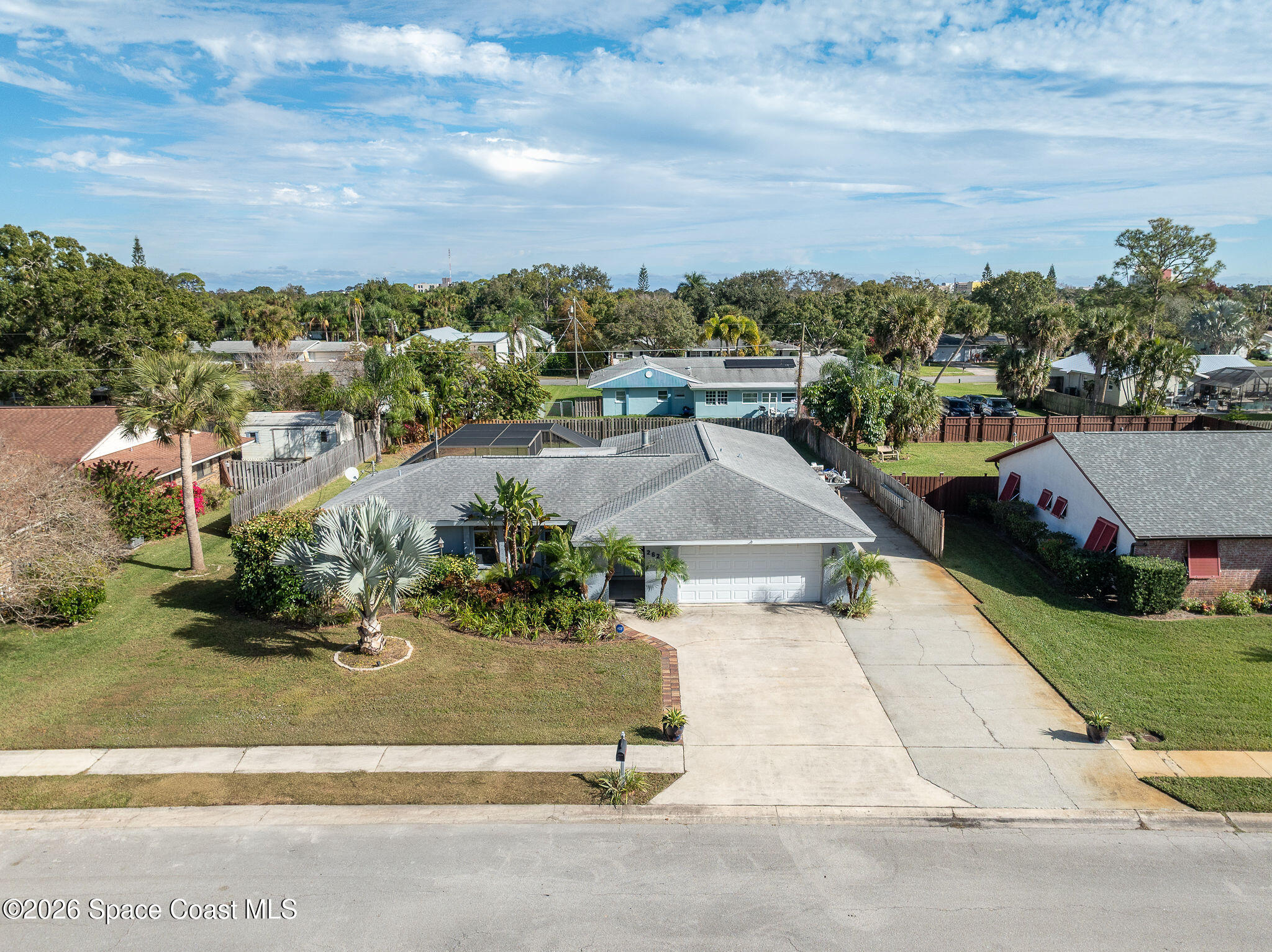 2623 Reed Avenue Melbourne, FL 32901 - Photo 4 of 45 an aerial view of residential houses with outdoor space and trees