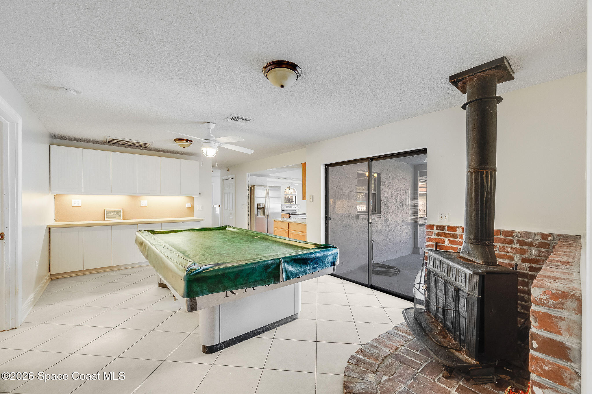 2623 Reed Avenue Melbourne, FL 32901 - Photo 42 of 45 a room with pool table and flat screen tv