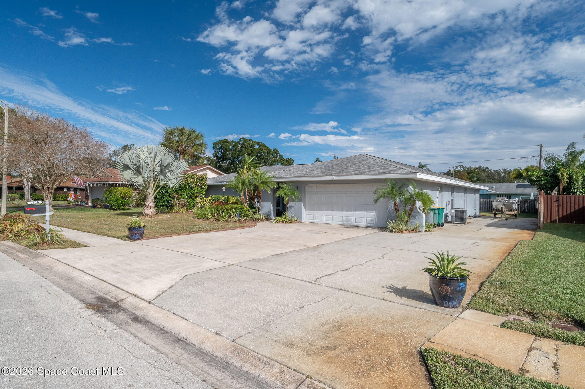2623 Reed Avenue Melbourne, FL 32901 - Photo 43 of 45 a view of a house with a yard and potted plants