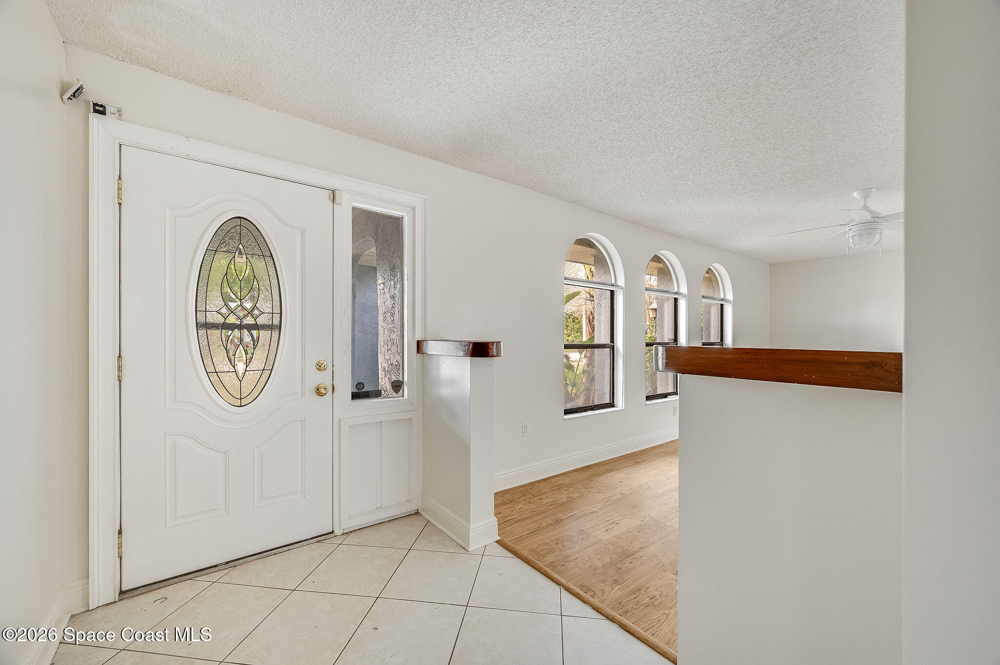 2623 Reed Avenue Melbourne, FL 32901 - Photo 6 of 45 a view of livingroom with furniture and mirror
