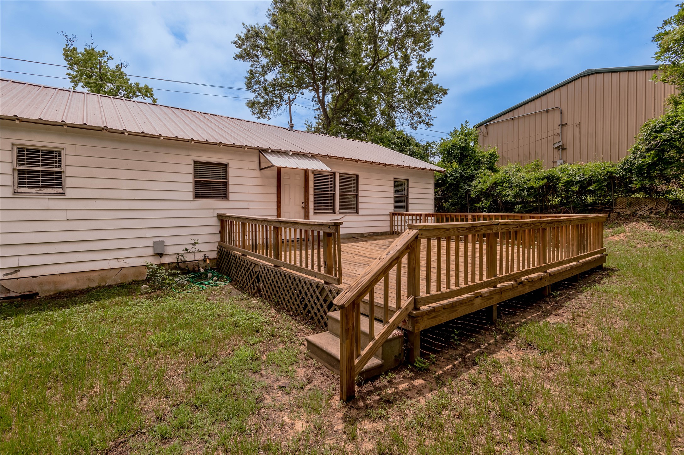 2538 Sycamore Avenue Huntsville, TX 77340 - Photo 29 of 31 a view of a house with wooden fence