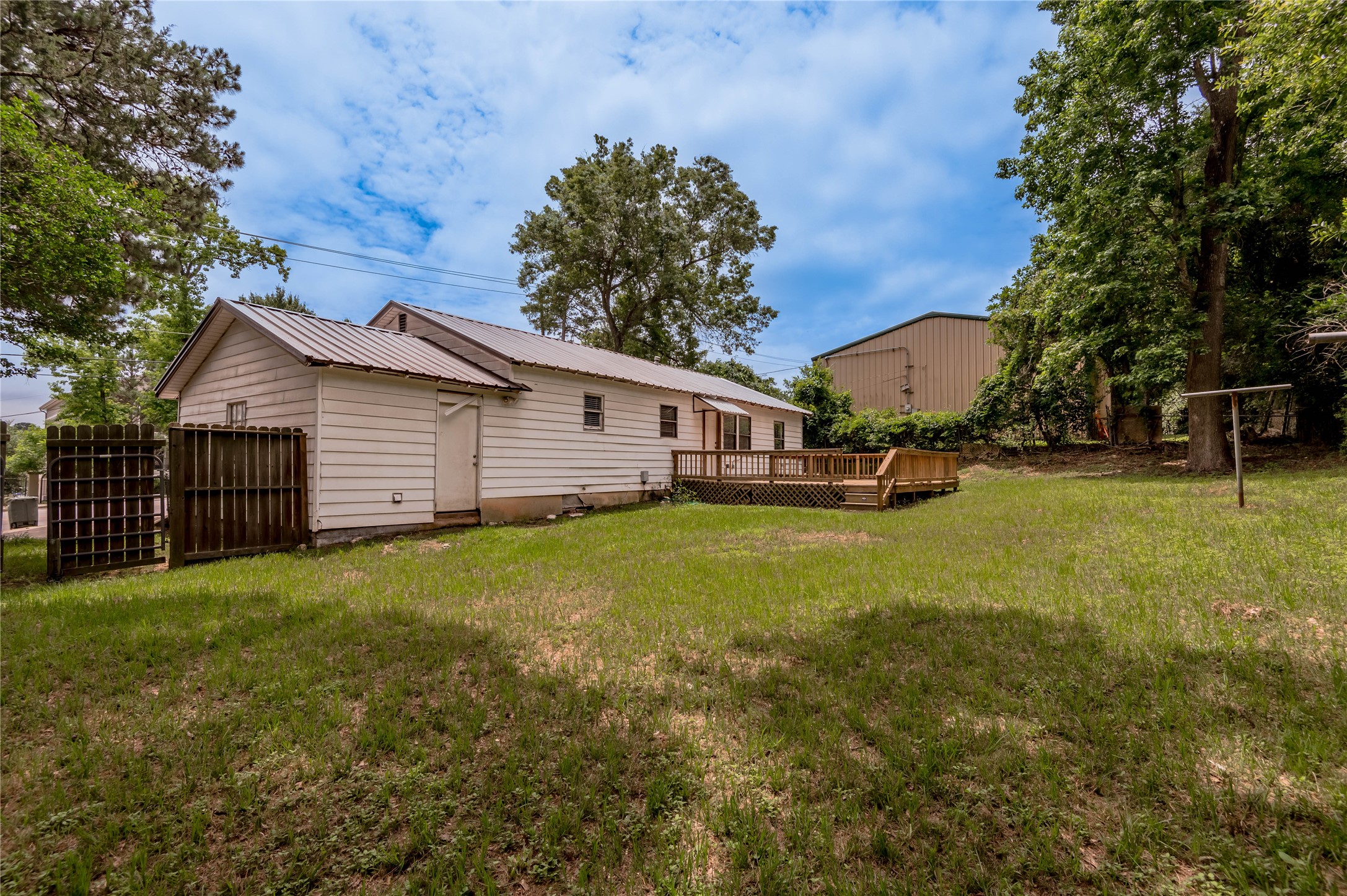 2538 Sycamore Avenue Huntsville, TX 77340 - Photo 30 of 31 a view of a house with a yard
