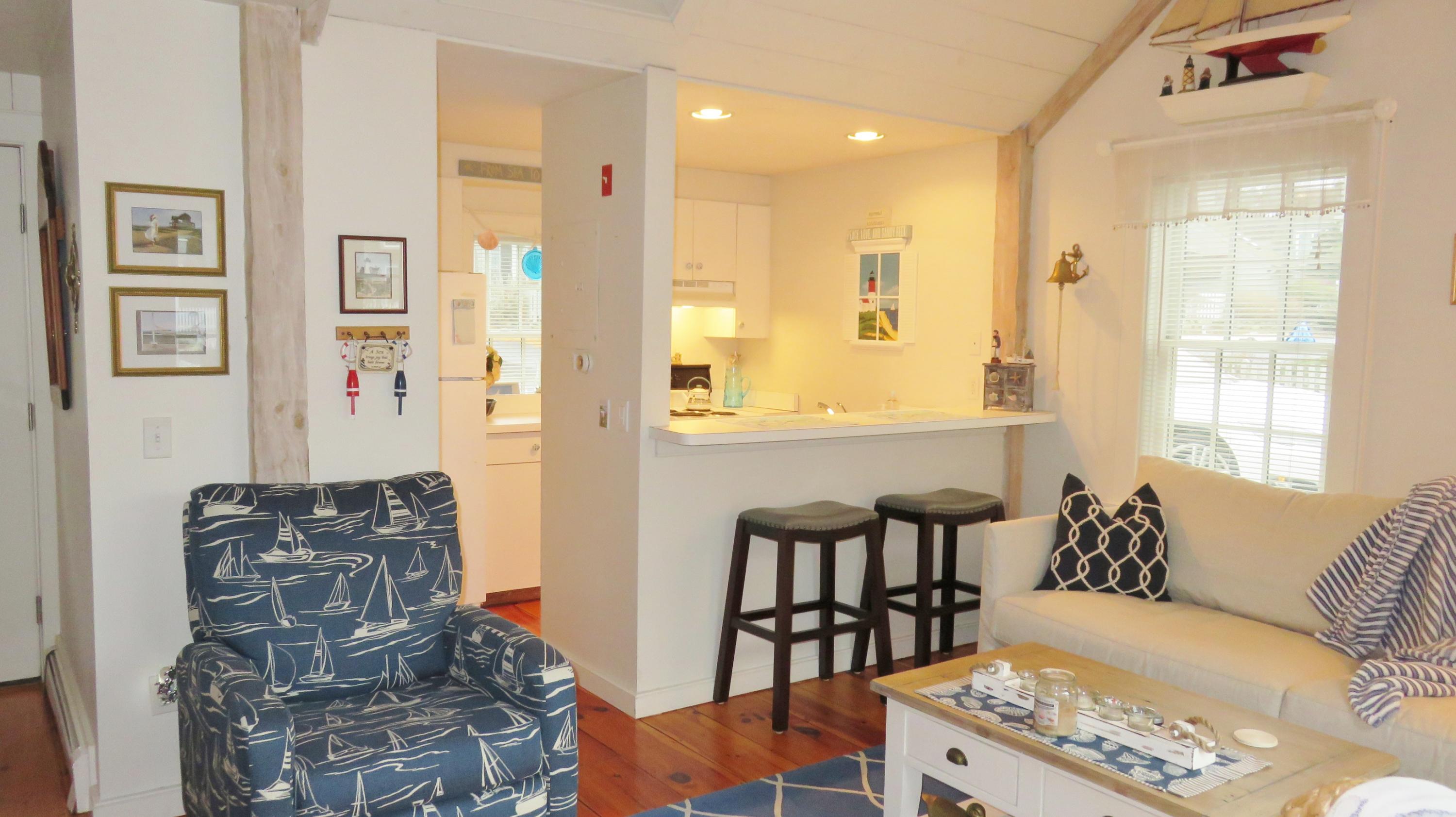 9 Hyannis Point Road, Unit 772 Mashpee, MA 02649 - Photo 14 of 29 a living room with furniture