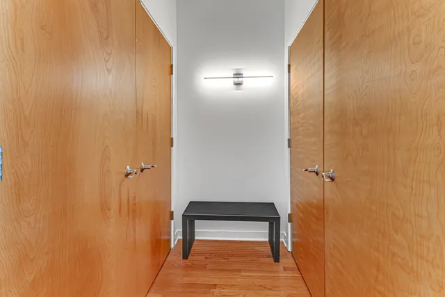 a view of bathroom with a sink and mirror