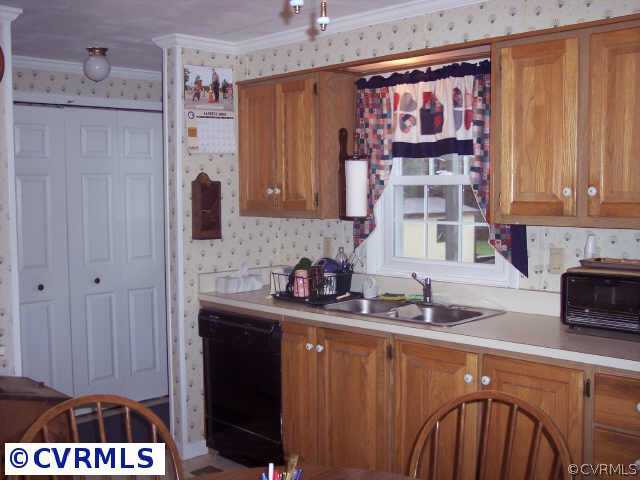 Other - Kitchen, looking to back door, laundry clo