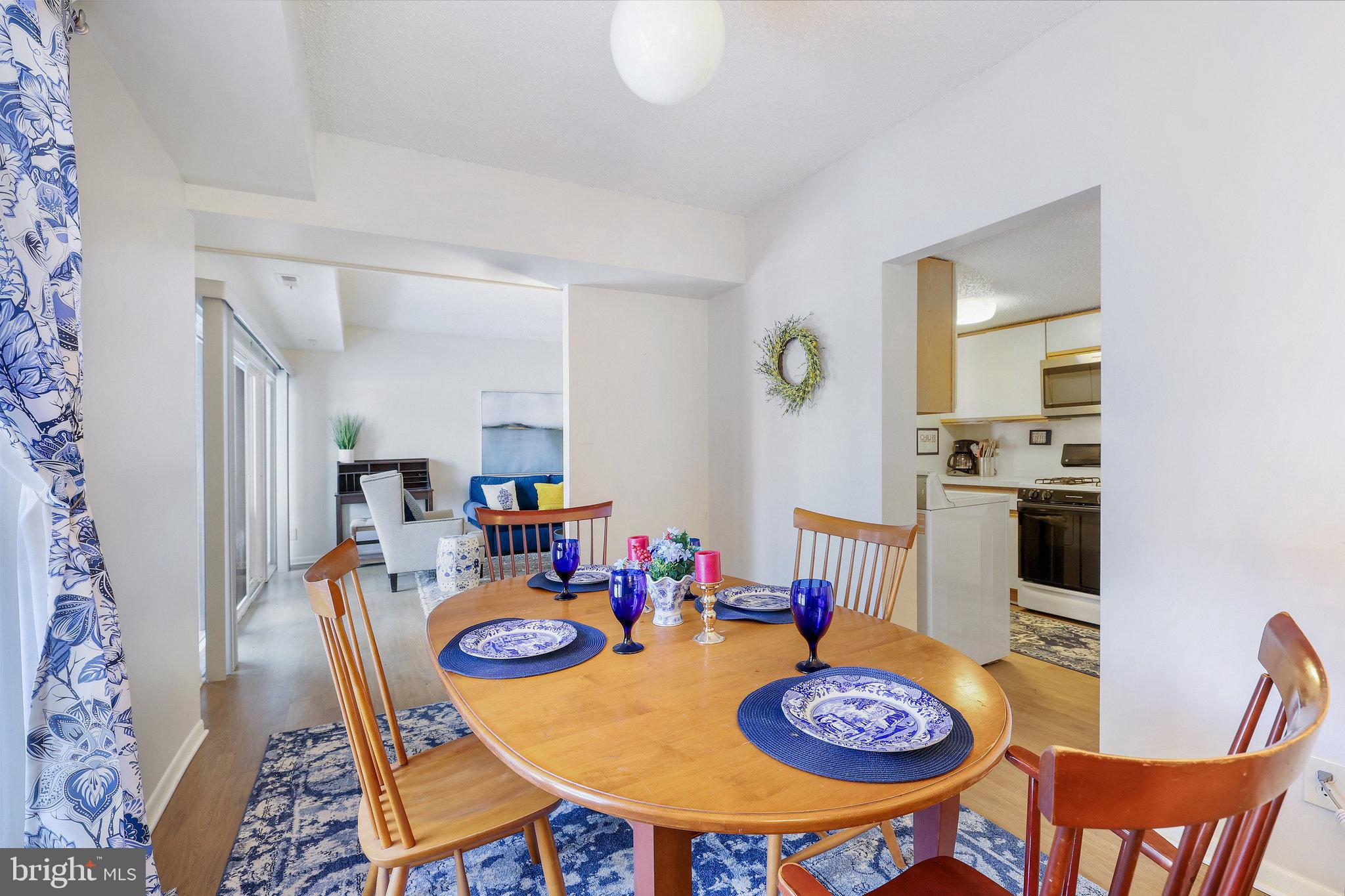 11812 Breton Court, Unit 1A Reston, VA 20191 - Photo 14 of 47 a table and chairs in a dining room