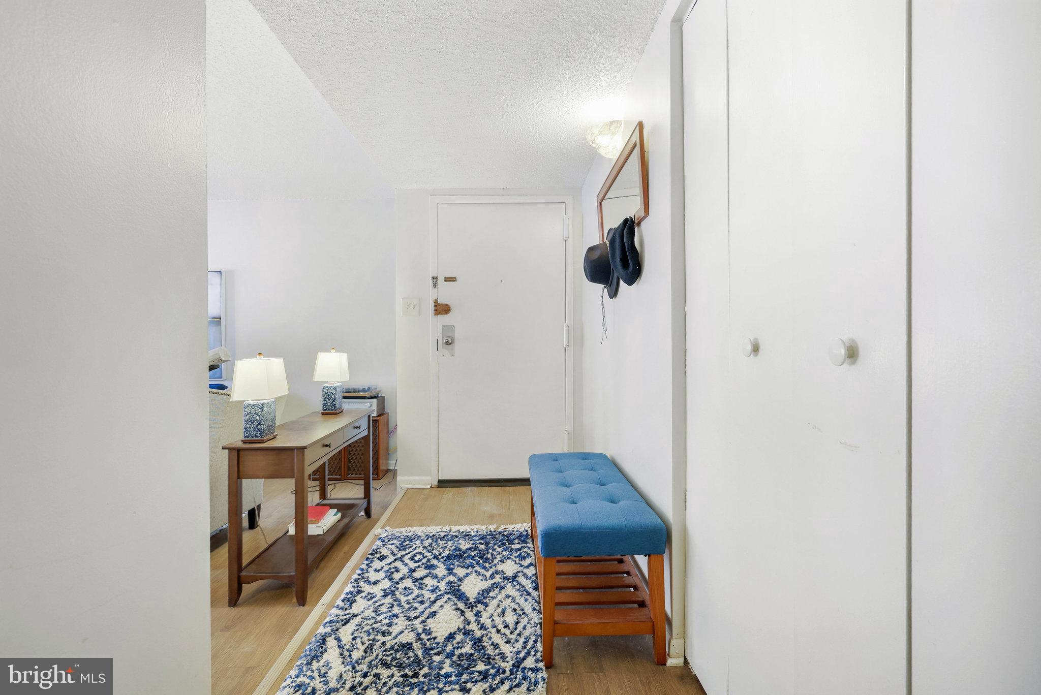 11812 Breton Court, Unit 1A Reston, VA 20191 - Photo 27 of 47 a rug a rug and a window