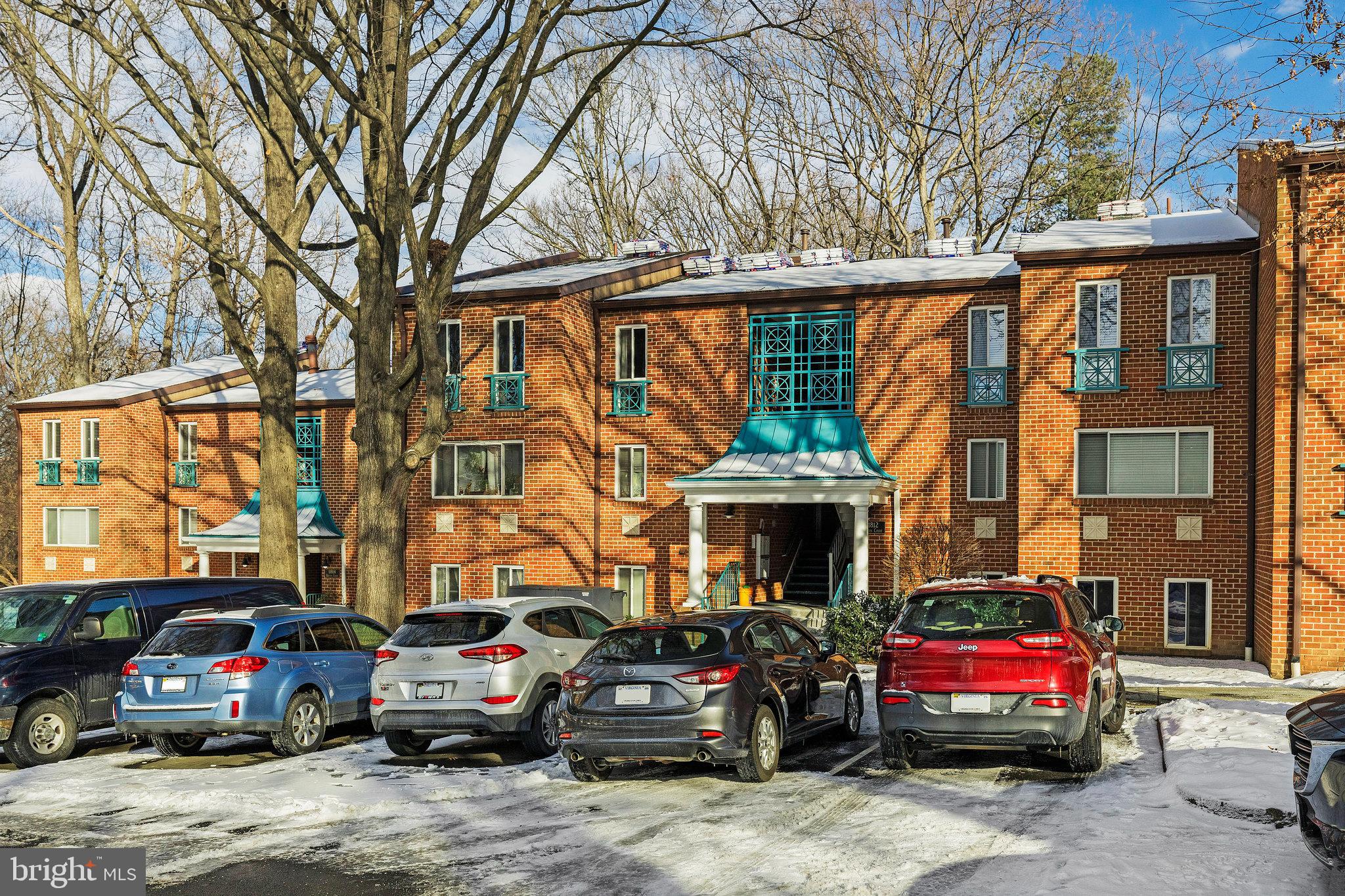 11812 Breton Court, Unit 1A Reston, VA 20191 - Photo 37 of 47 a car parked in front of a building