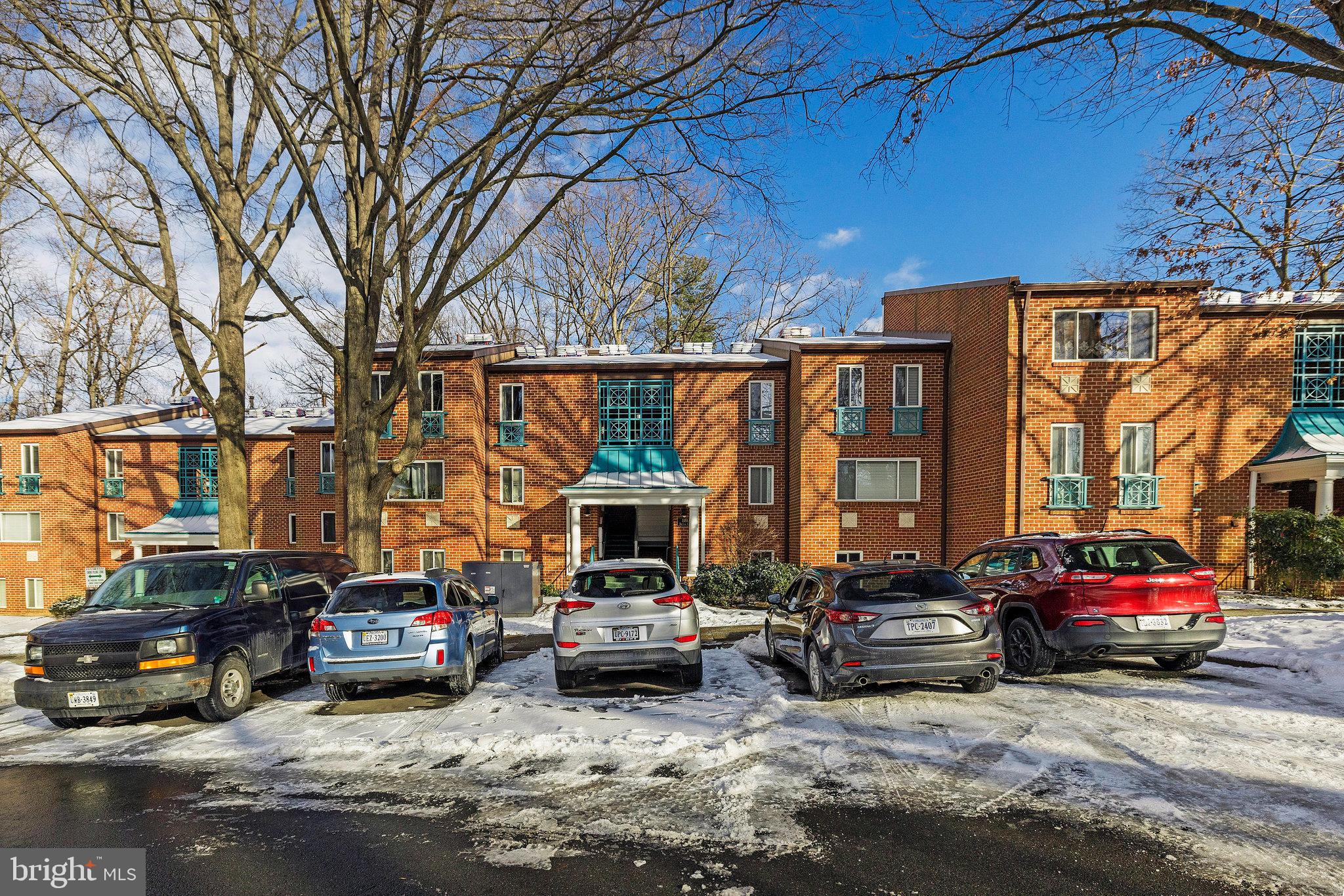 11812 Breton Court, Unit 1A Reston, VA 20191 - Photo 38 of 47 a view of street with parked cars