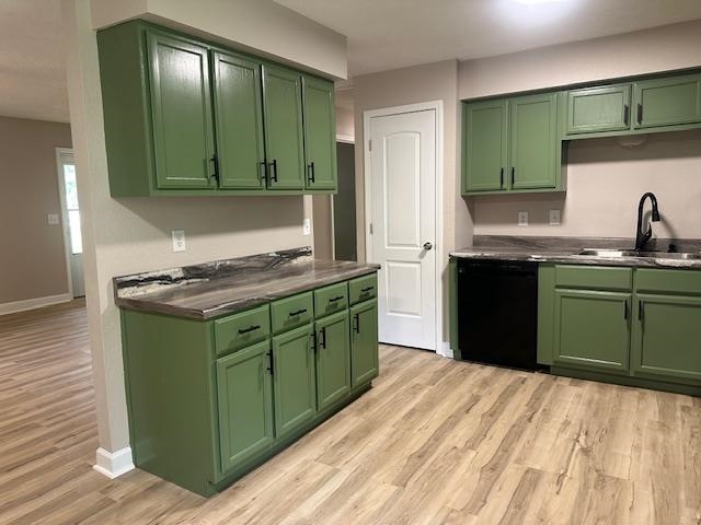 15 Brookwood Loop Adamsville, TN 38310 - Photo 3 of 21 a kitchen with a sink and cabinets