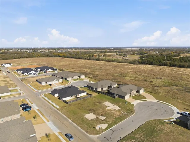 a view of a lake with a city
