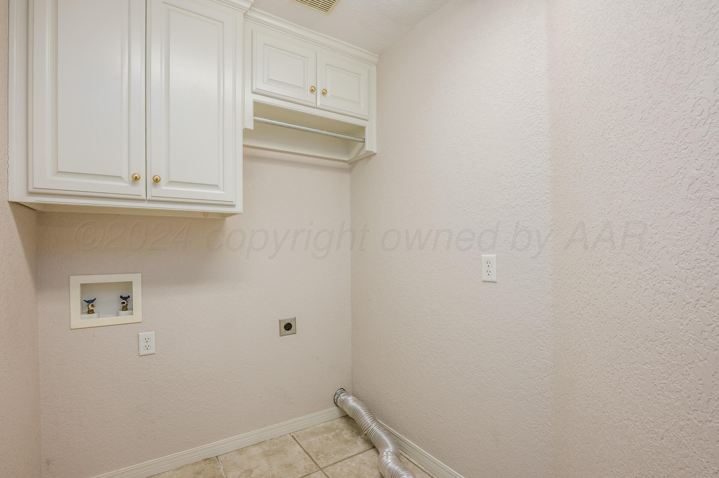 6308 Academy Drive Amarillo, TX 79119 - Photo 11 of 21 a bathroom with a sink