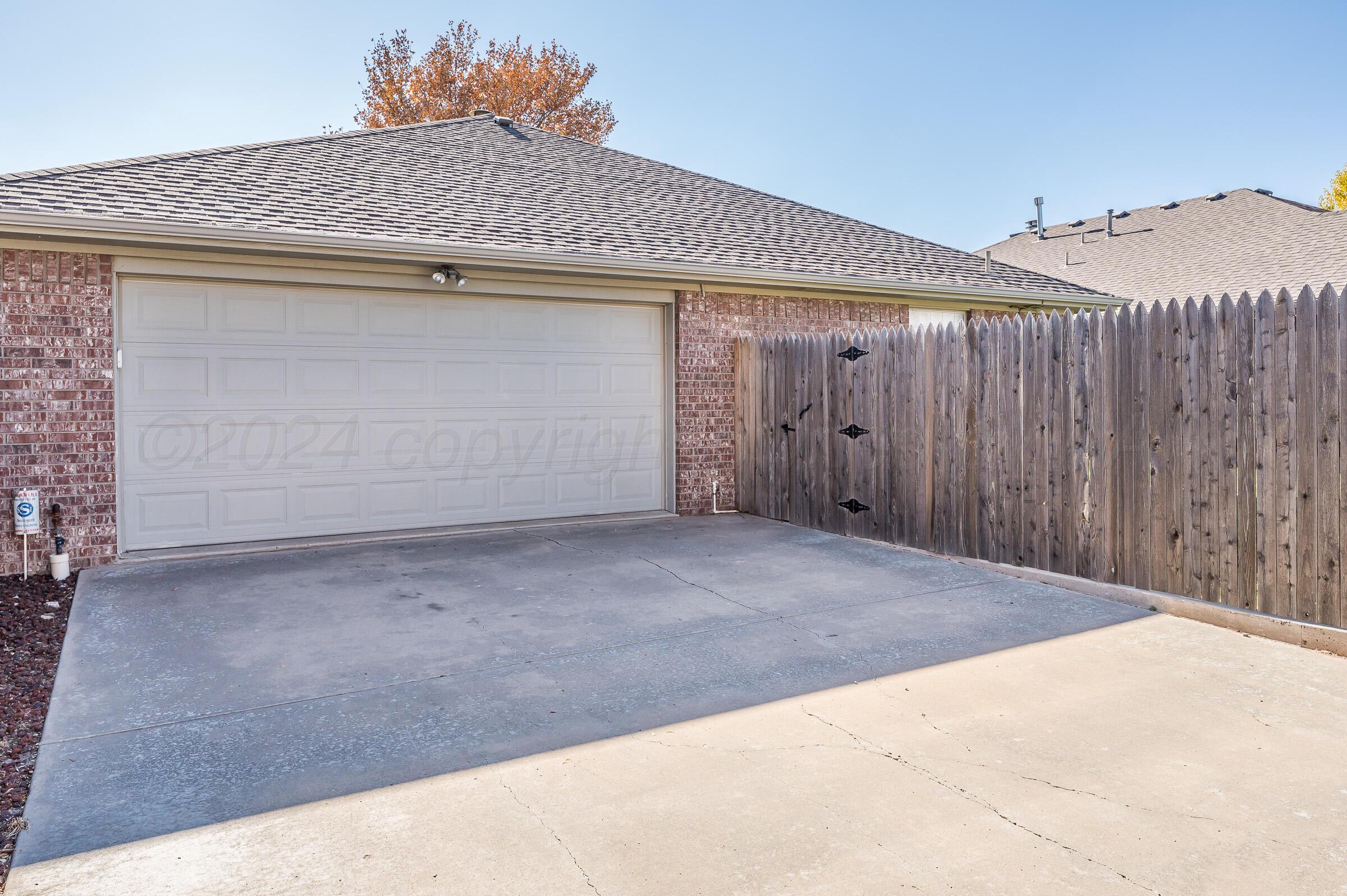6308 Academy Drive Amarillo, TX 79119 - Photo 21 of 21 a view of a garage
