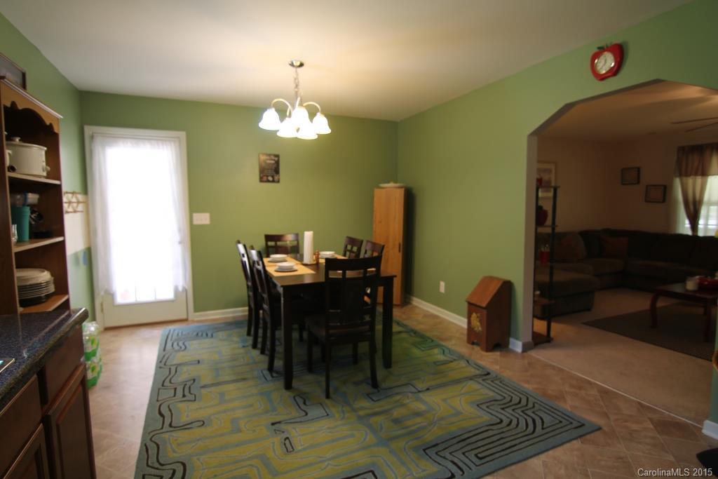 3807 White Store Road, Unit TRACT 1 W Wingate, NC 28174 - Photo 12 of 20 a view of a dining room with furniture