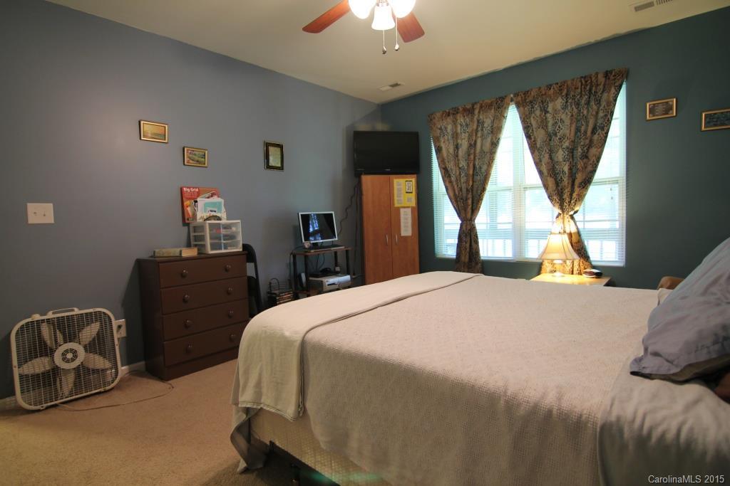 3807 White Store Road, Unit TRACT 1 W Wingate, NC 28174 - Photo 16 of 20 a bedroom with a bed and a window