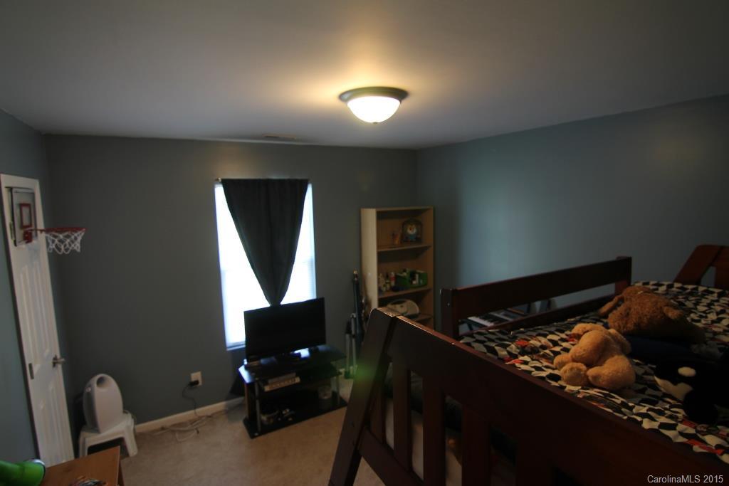 3807 White Store Road, Unit TRACT 1 W Wingate, NC 28174 - Photo 19 of 20 a room with furniture and wooden floor