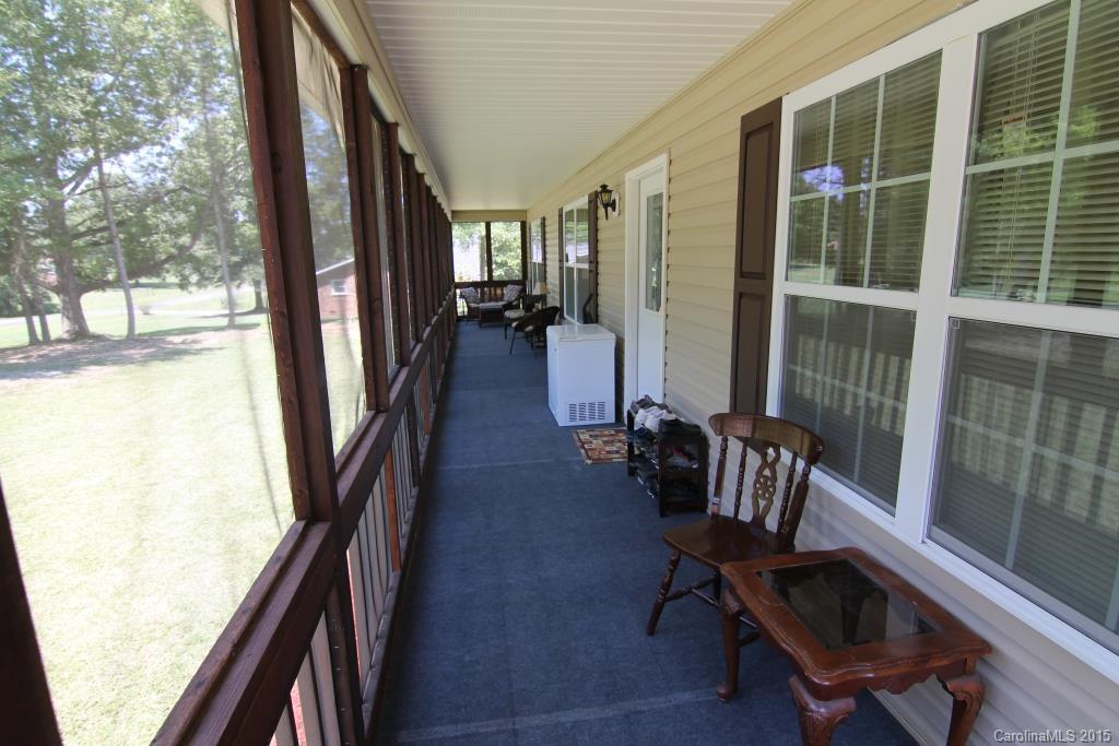 3807 White Store Road, Unit TRACT 1 W Wingate, NC 28174 - Photo 10 of 20 a view of a hallway with wooden floor and furniture