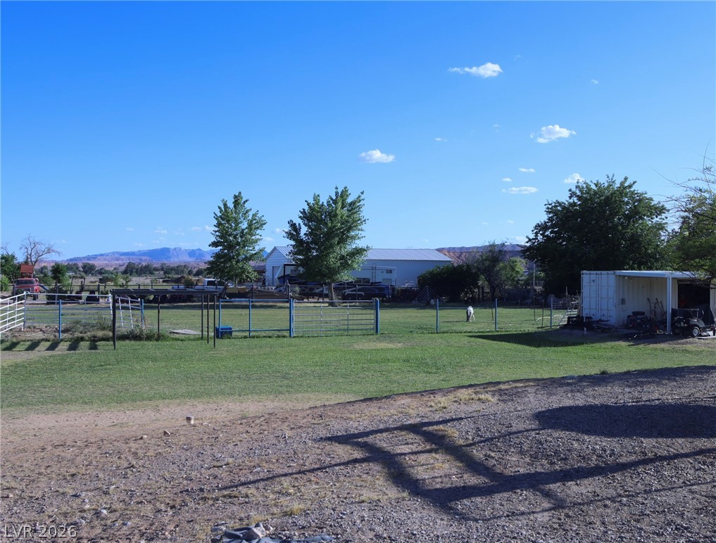 2775 Taylor Street Logandale, NV 89021 - Photo 35 of 41 Expansive acreage provides ample space for equestrian pursuits, featuring fenced paddocks and mature trees.