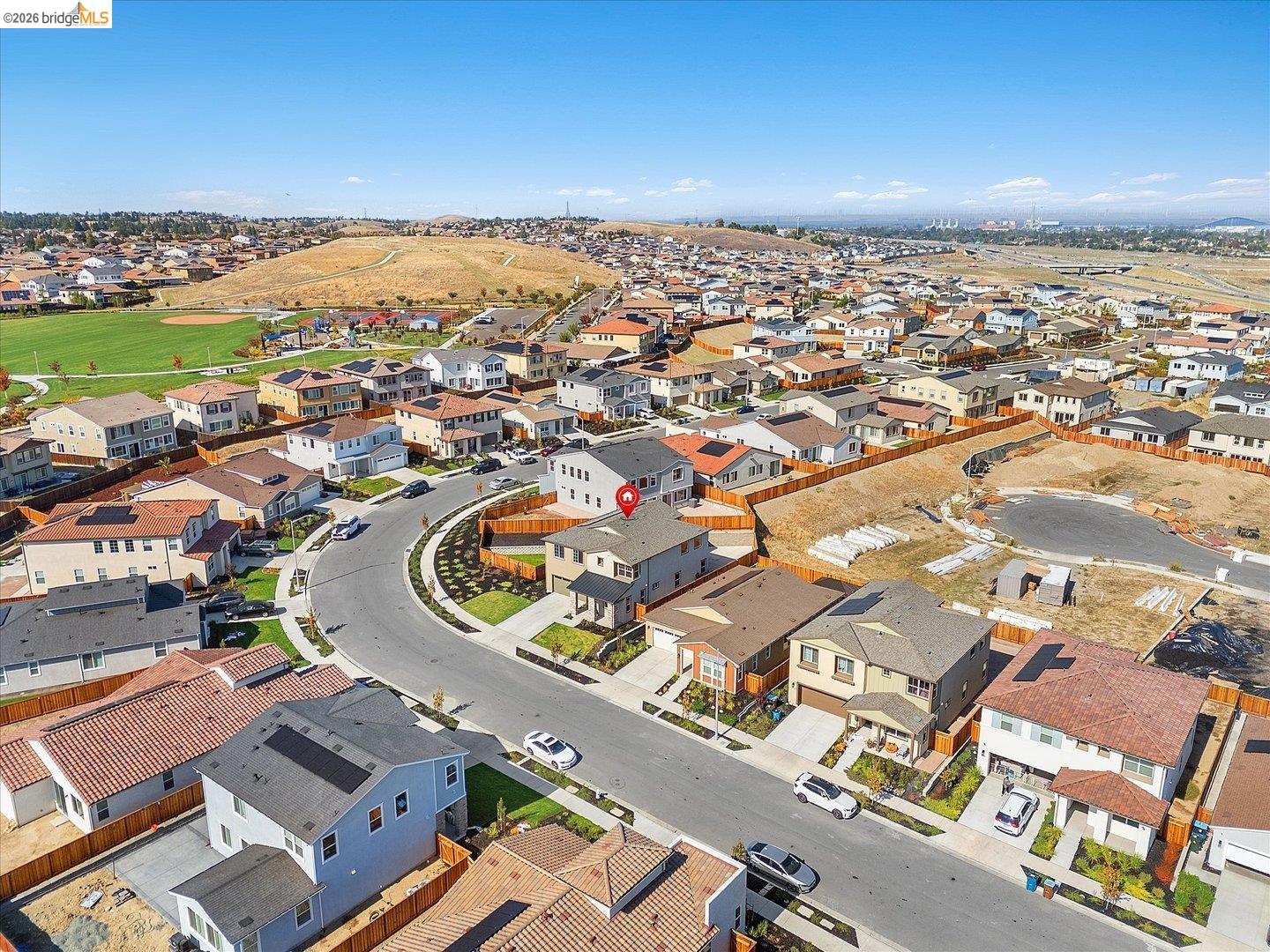 5601 Ridgepoint Way Antioch, CA 94531 - Photo 51 of 59 Aerial perspective highlighting a suburban residential area with a curved street layout