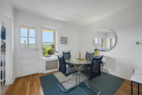 a workspace with furniture and a window