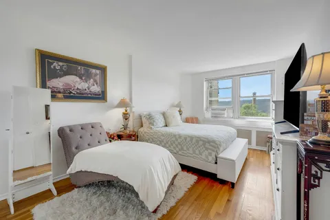 a bathroom with a sink a mirror and a shower