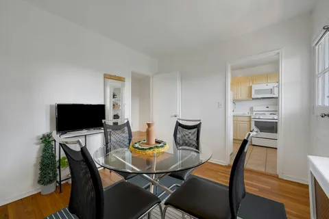 a view of a dining room with furniture