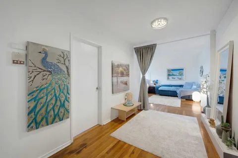 a bed room with a bed and a couch