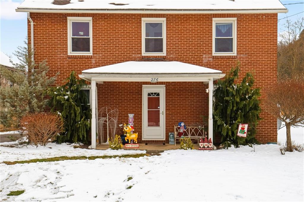 276 Glessner Road Johnstown, PA 15905 - Photo 2 of 36 a front view of a house with a yard