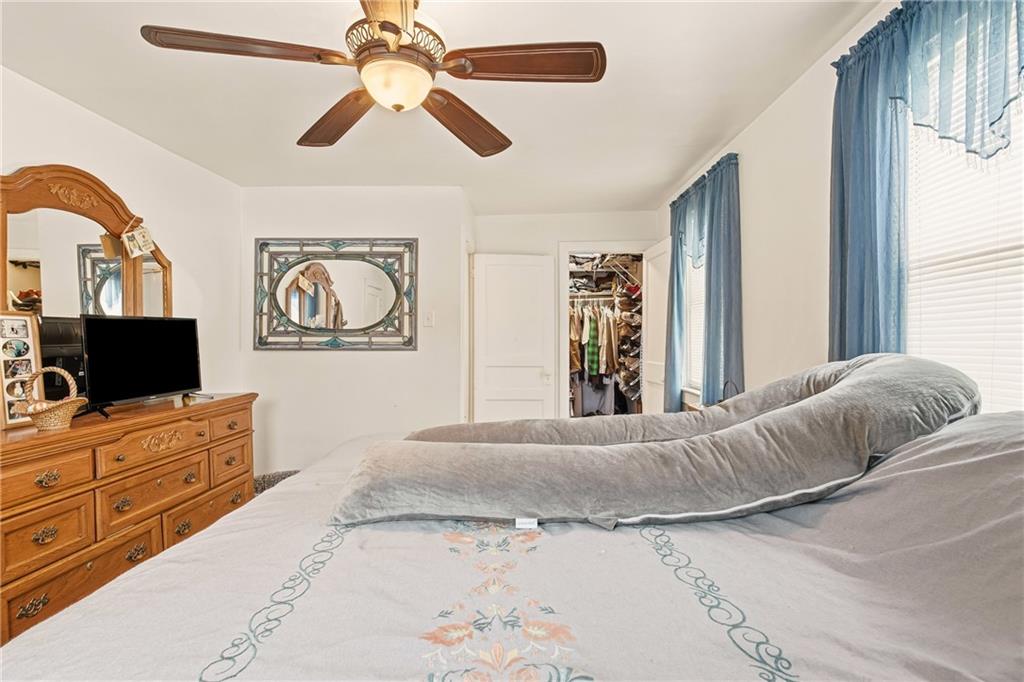 276 Glessner Road Johnstown, PA 15905 - Photo 23 of 36 a bedroom with a bed and wooden floor