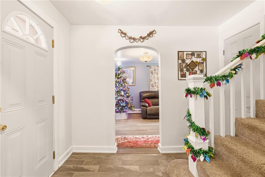 276 Glessner Road Johnstown, PA 15905 - Photo 5 of 36 a living room with furniture and flowers