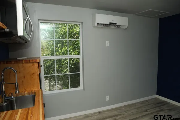 a view of a room that has a window in it