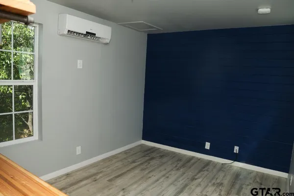 an empty room and window