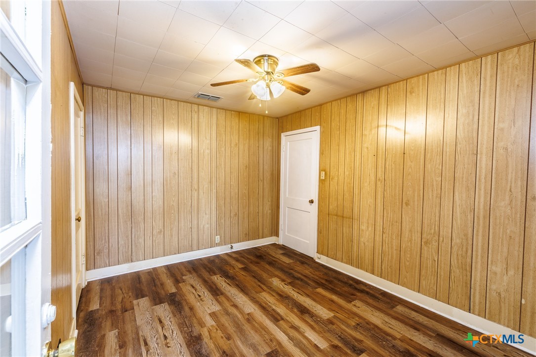 921 Robertson Gonzales, TX 78629 - Photo 15 of 31 a view of entryway with wooden floor