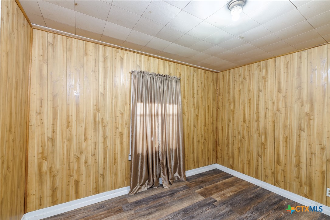 921 Robertson Gonzales, TX 78629 - Photo 16 of 31 a view of a room with a wooden door