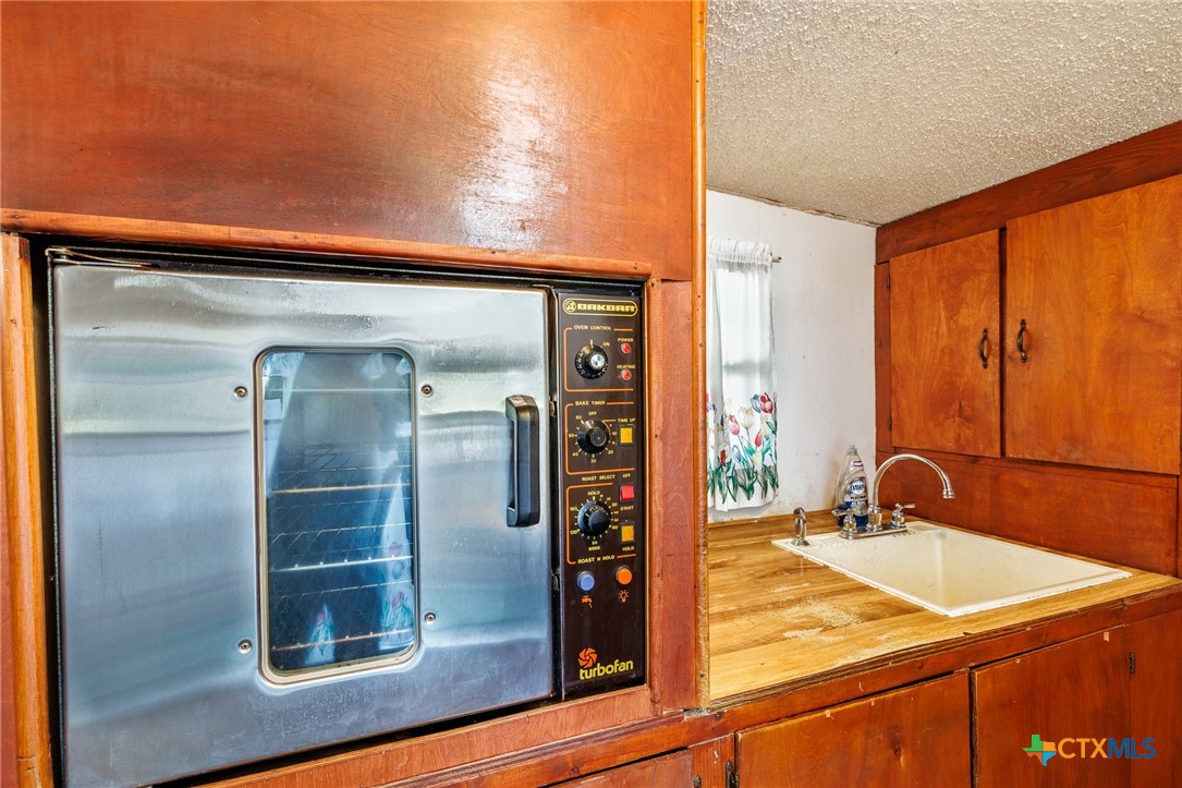 921 Robertson Gonzales, TX 78629 - Photo 10 of 31 Kitchen with commercial grade appliance