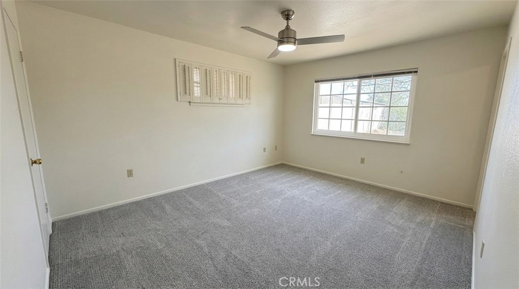 27077 El Rancho Drive Menifee, CA 92586 - Photo 7 of 11 a view of an empty room with a window