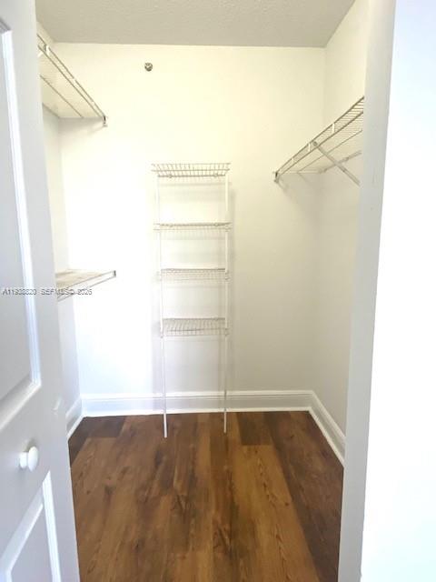 2061 Renaissance Boulevard, Unit 204 Miramar, FL 33025 - Photo 11 of 30 a view of a room with racks on the wall