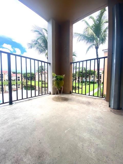 2061 Renaissance Boulevard, Unit 204 Miramar, FL 33025 - Photo 23 of 30 a view of an empty room with a balcony