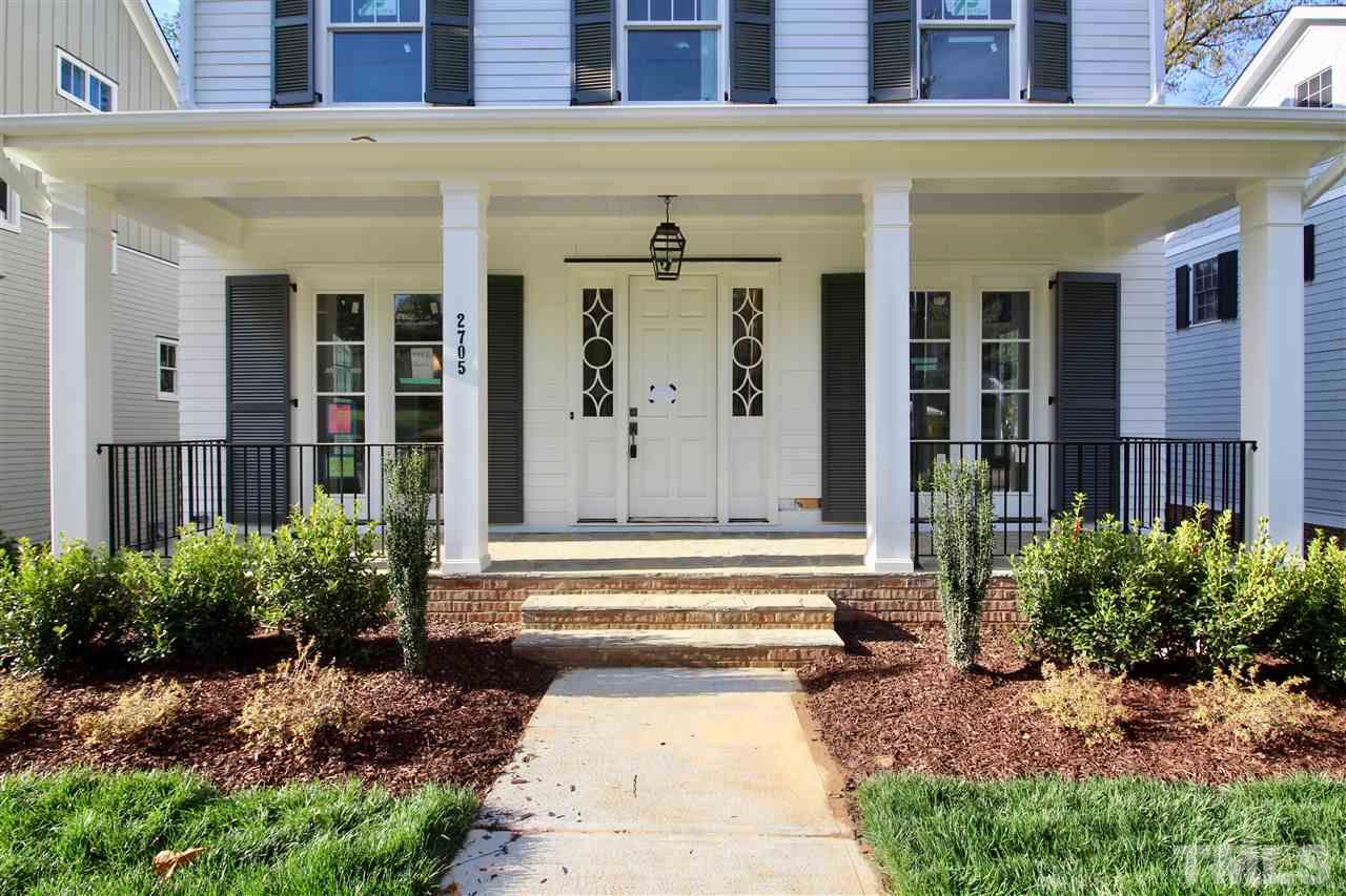 2705 1/2 Gordon Street Raleigh, NC 27608 - Photo 2 of 25 a front view of a house with a garden