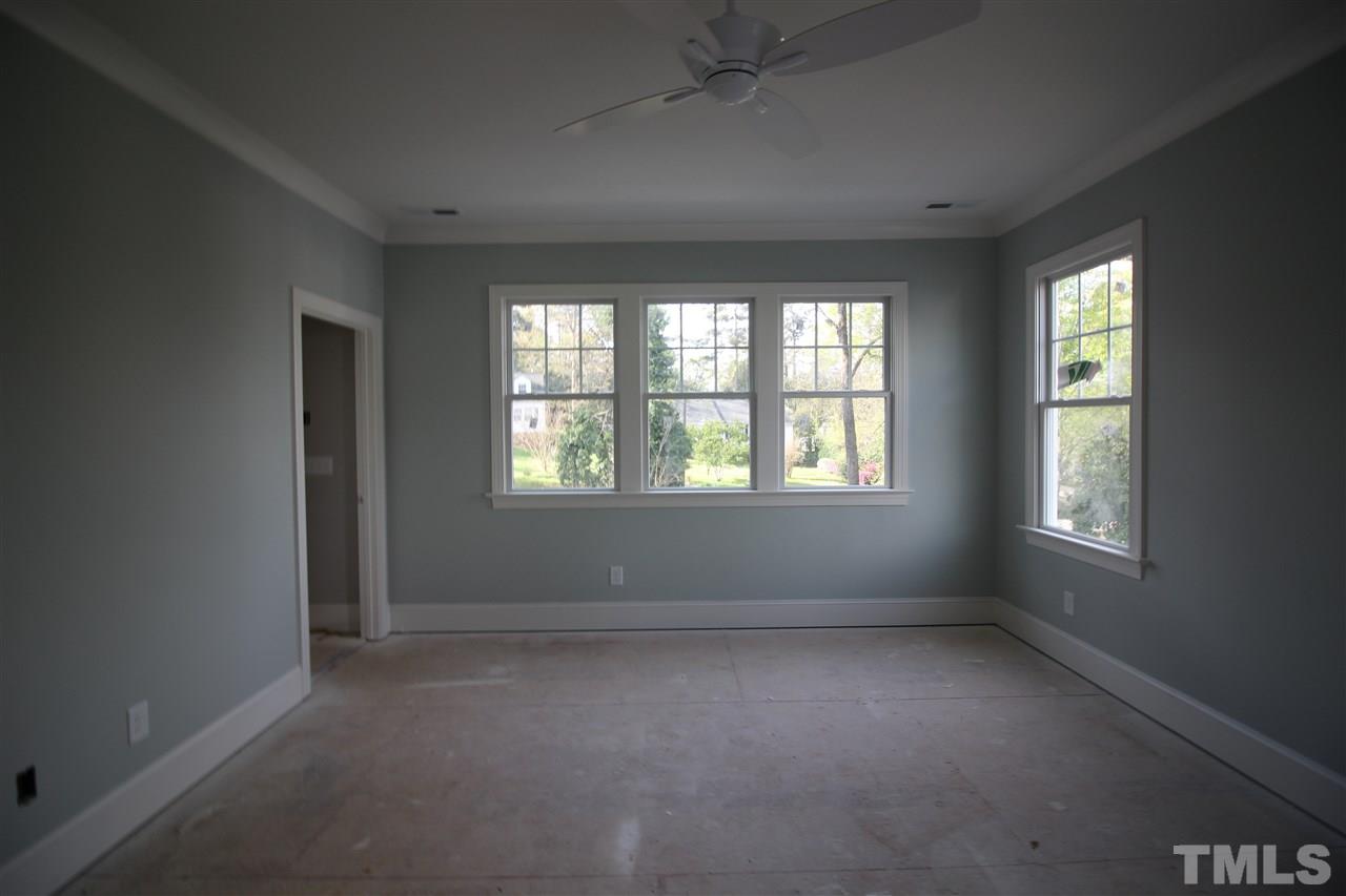 2705 1/2 Gordon Street Raleigh, NC 27608 - Photo 19 of 25 an empty room with windows