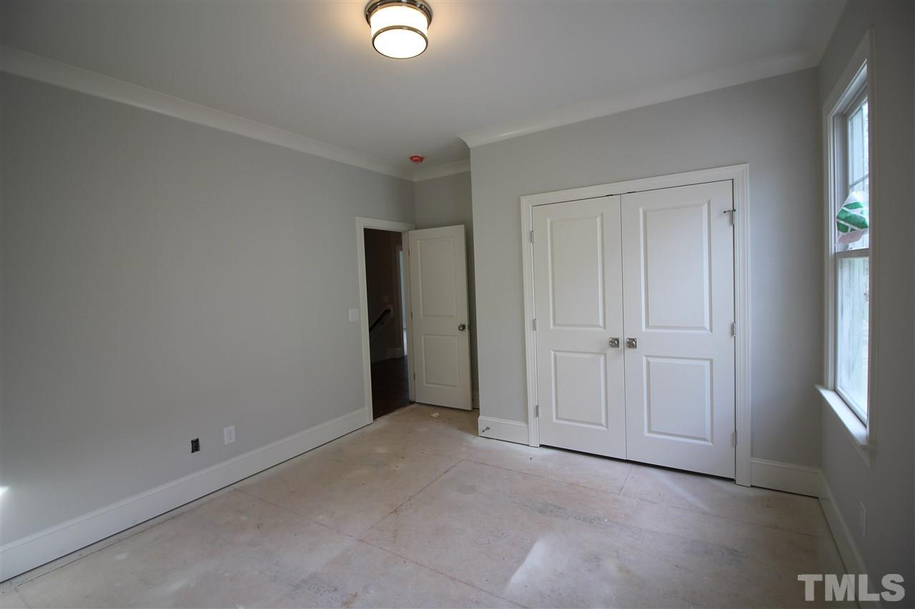 2705 1/2 Gordon Street Raleigh, NC 27608 - Photo 22 of 25 a view of an empty room and window
