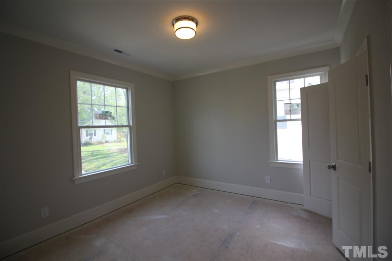 2705 1/2 Gordon Street Raleigh, NC 27608 - Photo 25 of 25 an empty room with a window
