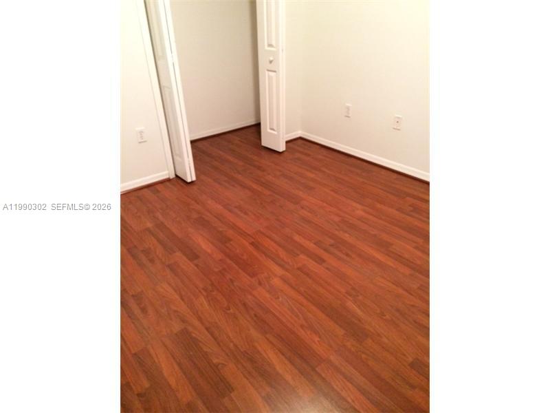 935 Northeast 33rd Terrace, Unit 203 Homestead, FL 33033 - Photo 8 of 26 Bedroom