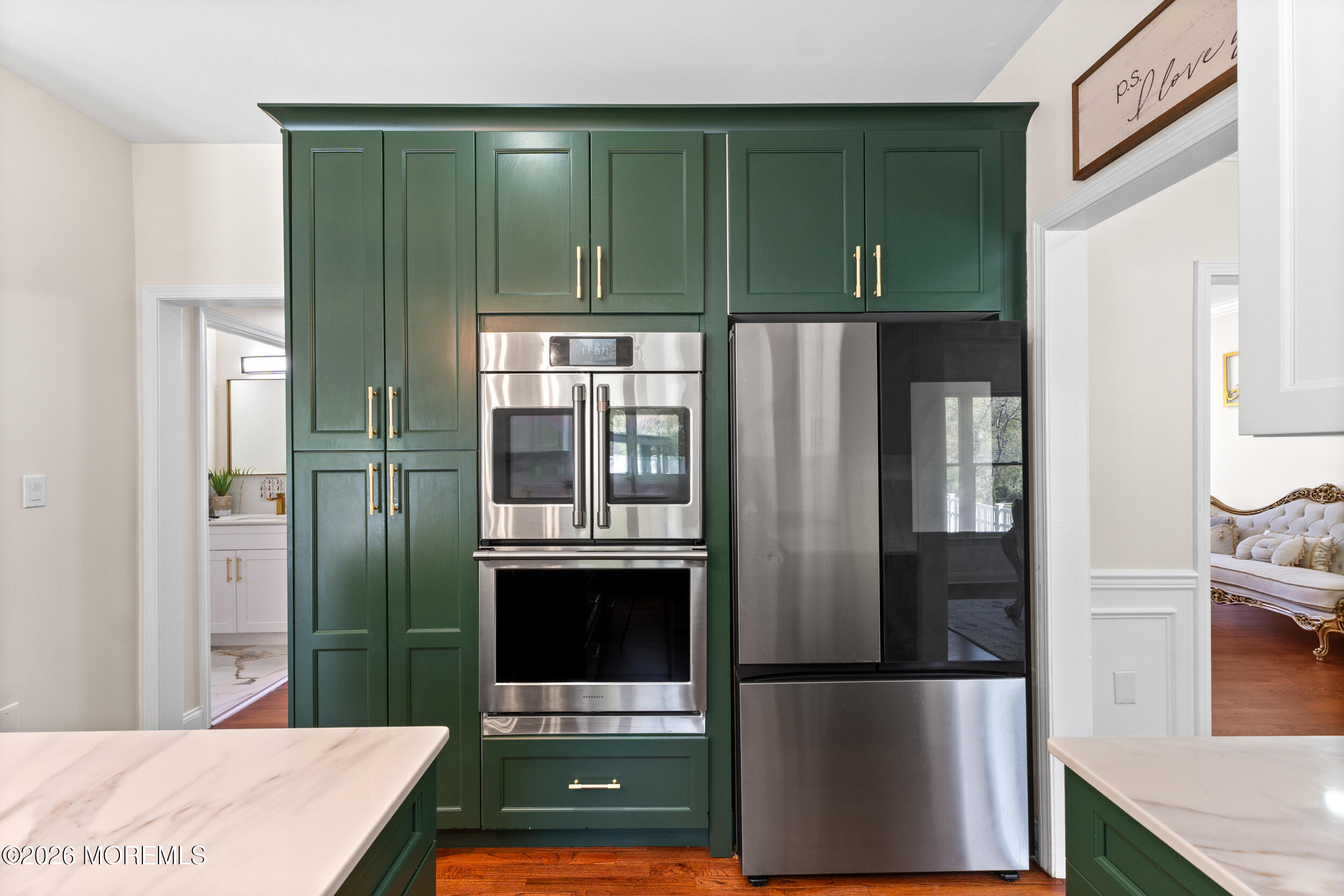 104 Autumn Road Matawan, NJ 07747 - Photo 13 of 64 a kitchen with a refrigerator and washer