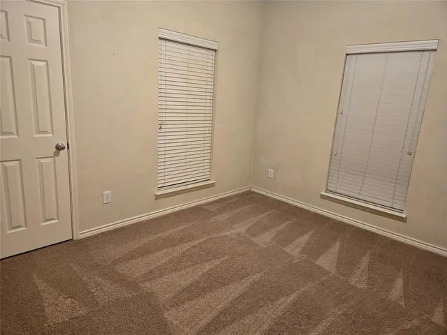 a bathroom with a toilet a sink and a shower