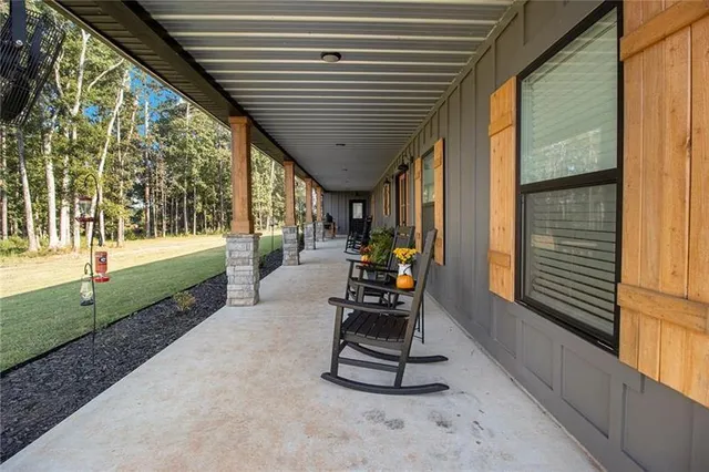 a view of a porch with chairs