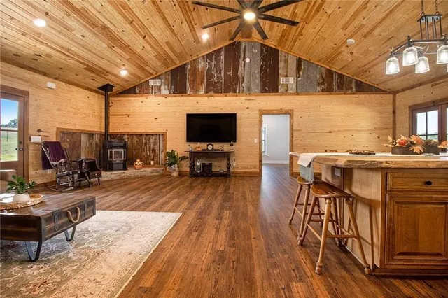 a view of a patio with wooden floor