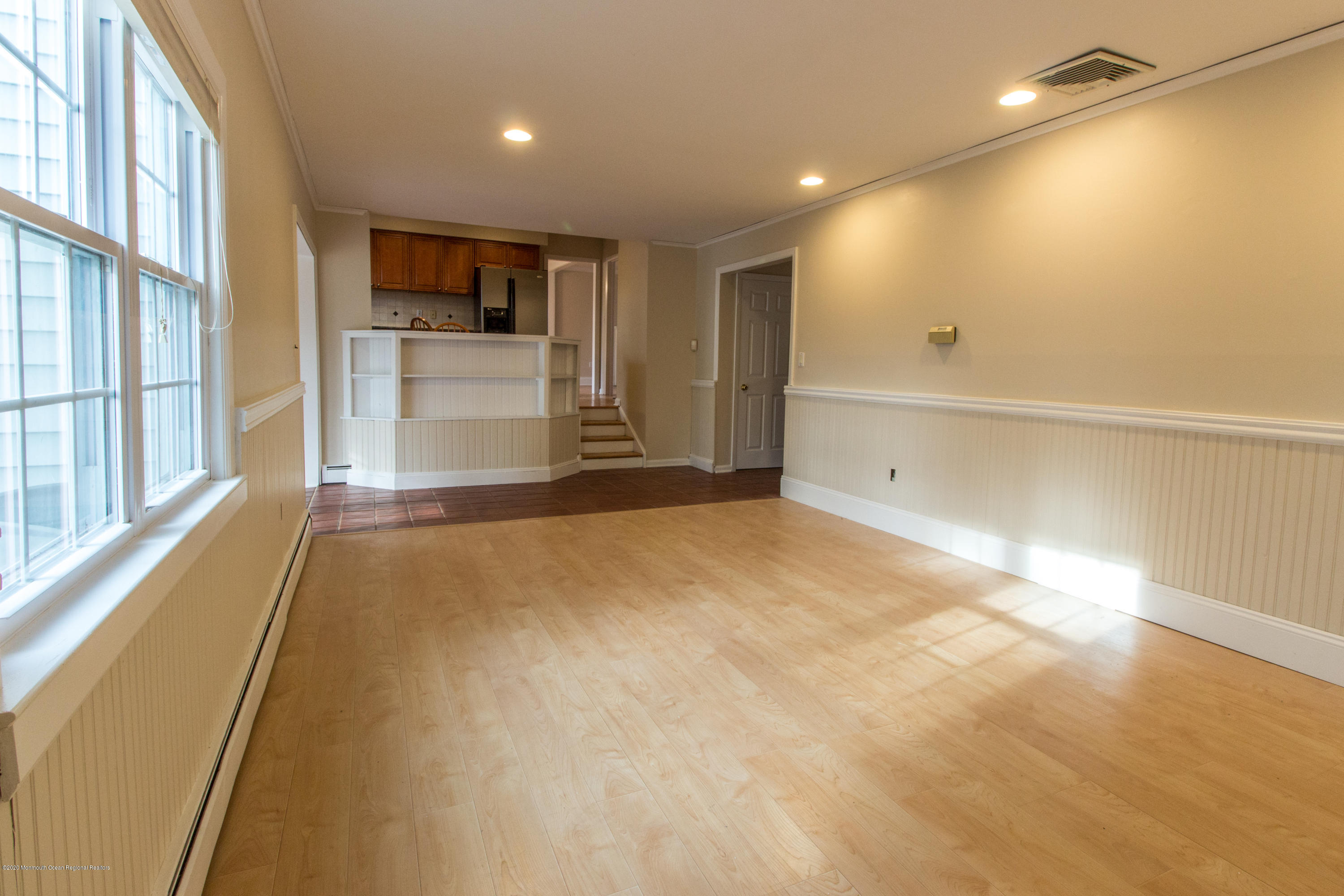14 Hill Road Lincroft, NJ 07738 - Photo 14 of 29 a view of an empty room with a kitchen