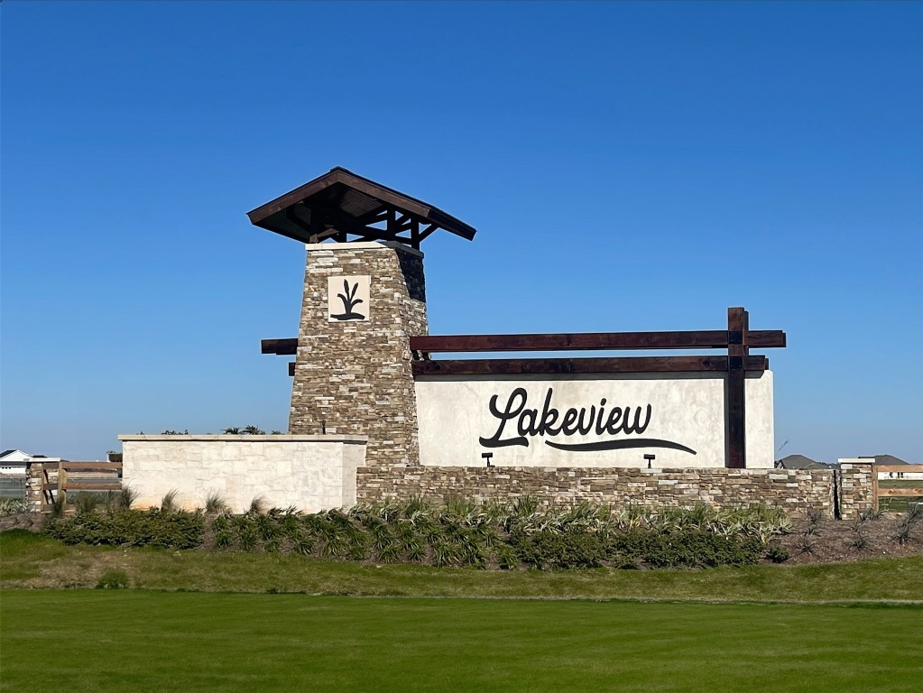 5033 Bluebell Way Waller, TX 77484 - Photo 22 of 23 a sign of golf club on a wall under a building