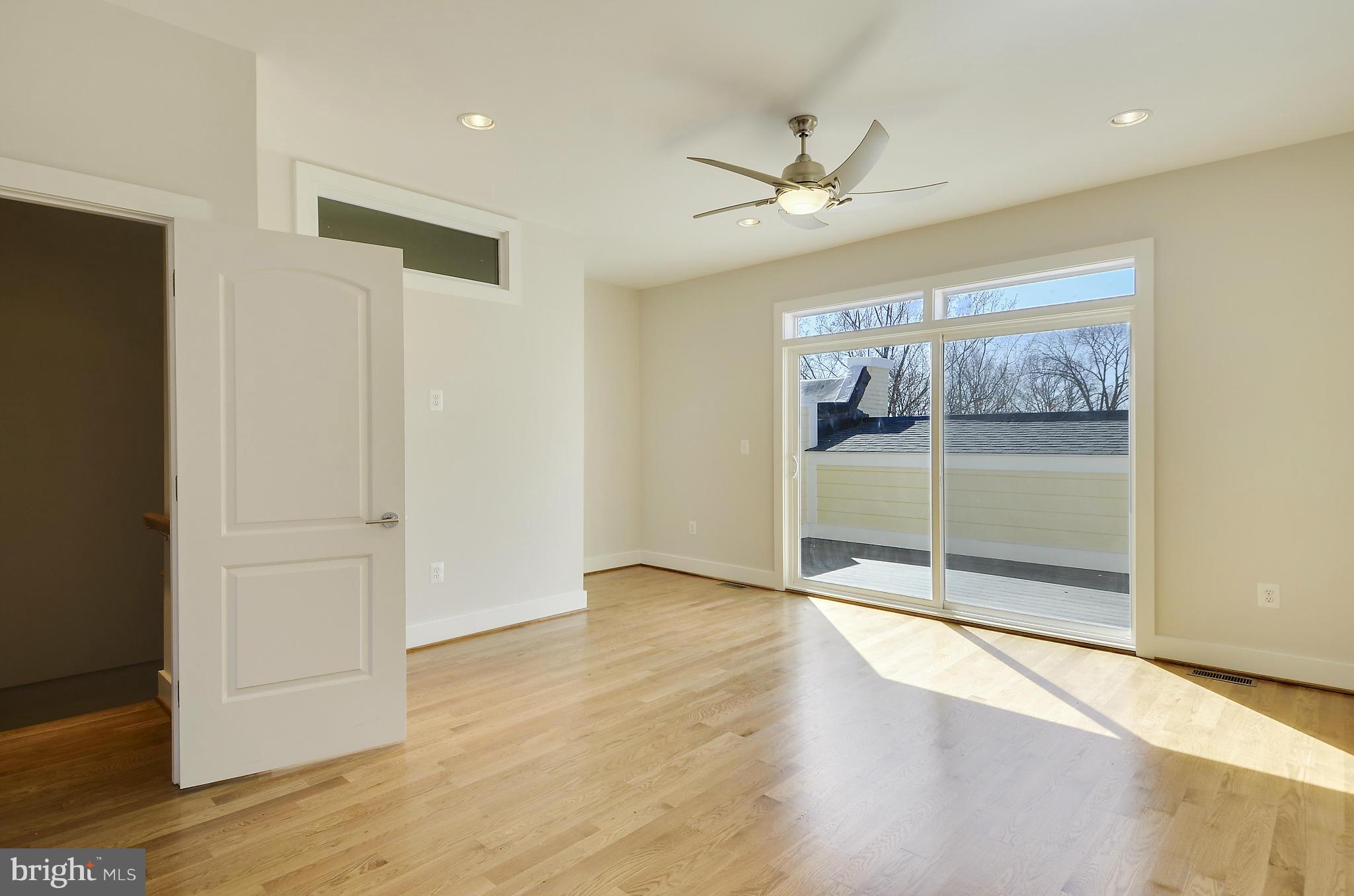 1350 K Street Southeast Washington, DC 20003 - Photo 19 of 28 wooden floor in an empty room with a window